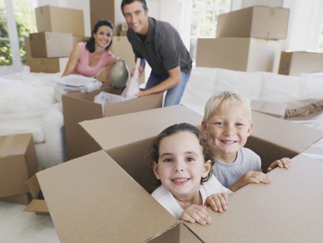 Moving van and boxes during a home move in West Hampstead