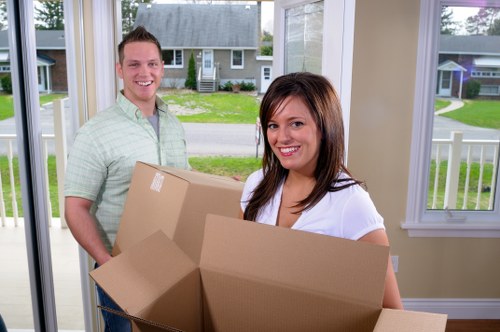Professional movers handling an apartment move in West Hampstead
