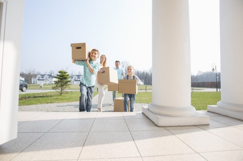 Commercial moving vehicle and office items ready for delivery