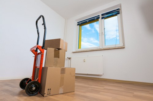 Careful furniture handling during a house move in West Hampstead