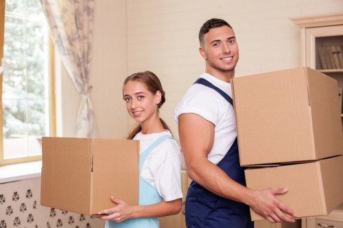 Careful packing of office equipment and documents for relocation